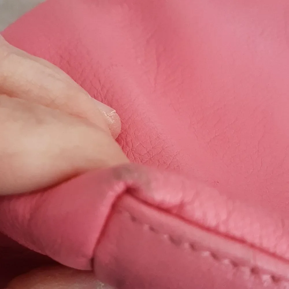 Pink and orange leathershoulder handbag